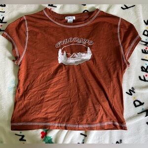 Brown Rue-21 crop t-shirt with “Colorado” sewn into the front with mountains.